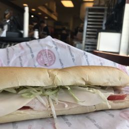 a sub sandwich on a wrapper