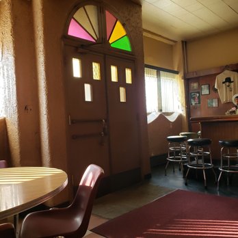 Mirabile's - a dining room with a table and chairs - Italian Near Me - Cleveland, Ohio Mirabile's - a dining room with a table and chairs - Italian Near Me - Cleveland, Ohio