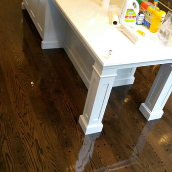 Floors by Liwaya - a white kitchen with wood floors - Flooring Near Me - Port Chester, New York Floors by Liwaya - a white kitchen with wood floors - Flooring Near Me - Port Chester, New York