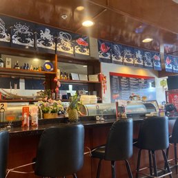 a bar with a lot of sushi a bar with a lot of sushi
