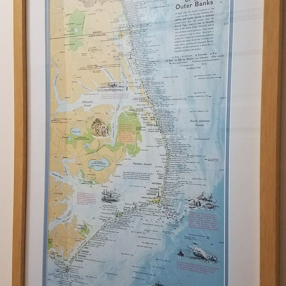 Poster I wanted framed. He picked the perfect matte and perfect frame.
