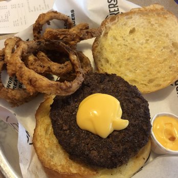 Fuddruckers - Half pound burger with onion rings - Burgers Near Me - Albuquerque, New Mexico