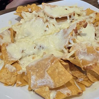 Los Arcos Kitchen and Cantina-North - One of the kiddos ordered chips and cheese. She was a huge fan of the cheese! - Mexican Near Me - Rochester, Minnesota