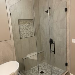 Bathroom remodel: glass, new tub and tile work.