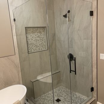 Harding Construction - Bathroom remodel: glass, new tub and tile work. - General Contractors Near Me