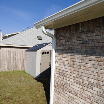 Bay Seamless Gutters - Rear right side of the house down spout - Gutter Services Near Me - Lynn Haven, Florida