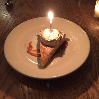 Isa Bistro - Apple pie tart with cinnamon whipped cream and a candle for my birthday - New American Near Me - Portland, Maine