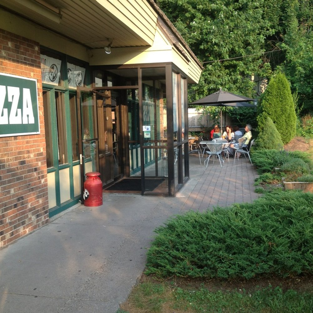 Naples Pizza - Like to dine out? There an out door patio that's open Spring - Fall. - Pizza Near Me - Farmington, Connecticut