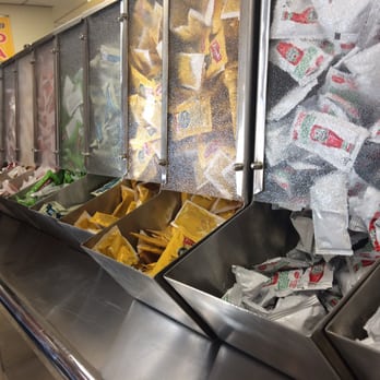 The Hat - All the sauce packets to dress your burgers and sandwiches, then add to the already full wastebaskets - Sandwiches Near Me - Murrieta, California