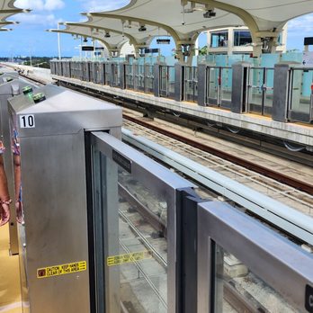 Honolulu Skyline - Rail boarding door - Trains Near Me - Aiea, Hawaii