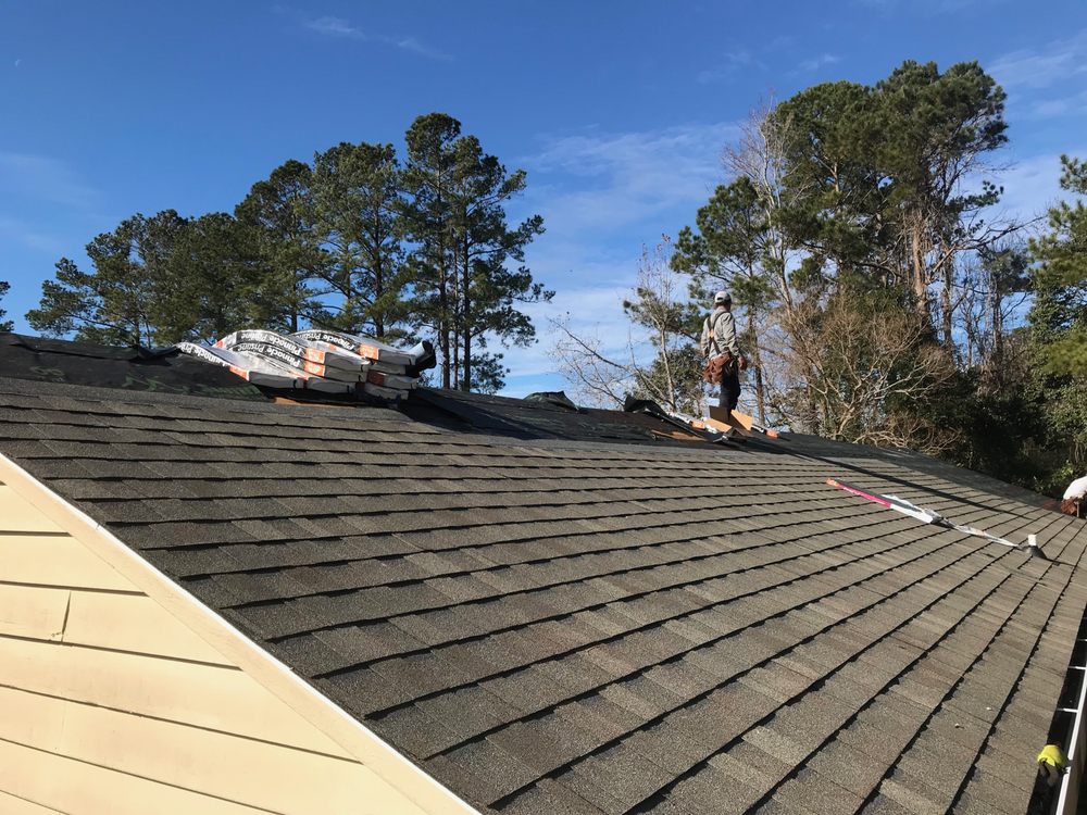 Slide of Up & Over Roofing