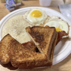 Northside Cafe - The "before". Two eggs, grits, bacon (3), toast and coffee!