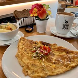 California Bean - Perfectly fluffy omelette. Lightly browned on the outside, tender on the inside.