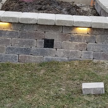 Picture Perfect Landscaping - a brick wall with lights - Landscaping Near Me Picture Perfect Landscaping - a brick wall with lights - Landscaping Near Me