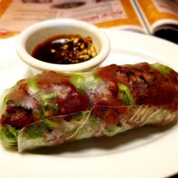 Saigon Cafe - a plate of food with a bowl of dipping sauce - Vietnamese Near Me - Buford, Georgia