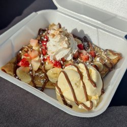 Crepas El Viejon - Most popular combination. Banana, strawberry  Nutella and vanilla ice cream