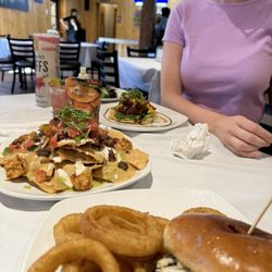 The Peak Restaurant and Bar - Pulled Pork Sandwich Surf n Turf Nachos Tuna tostada