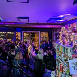 An audience sits awaiting the start of don't tell comedy at the shop. The comedians were really good! It's such a neat atmosphere.