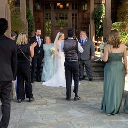 Sarah (whose backside is pictures here, is doing her job, herding people for photos at the wedding!! Notice her gracious bossiness! Sarah (whose backside is pictures here, is doing her job, herding people for photos at the wedding!! Notice her gracious bossiness!