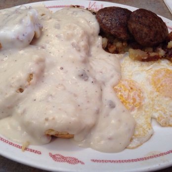 Yorkshire Restaurant - Hungry Man Breakfast w/ 2 eggs, home fries, sausage, and sausage gravy over biscuits - Breakfast & Brunch Near Me - Manassas, Virginia Yorkshire Restaurant - Hungry Man Breakfast w/ 2 eggs, home fries, sausage, and sausage gravy over biscuits - Breakfast & Brunch Near Me - Manassas, Virginia