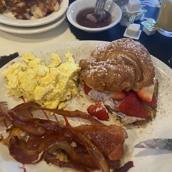 Maureen's Kitchen - Croissant French Toast Special with blue berry cream cheese and strawberries. Side of Bacon and scrambled Eggs - Breakfast & Brunch Near Me - Smithtown, New York Maureen's Kitchen - Croissant French Toast Special with blue berry cream cheese and strawberries. Side of Bacon and scrambled Eggs - Breakfast & Brunch Near Me - Smithtown, New York
