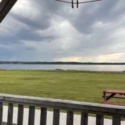 Seaview Cottages - Storm clouds moving in from our covered front deck area
