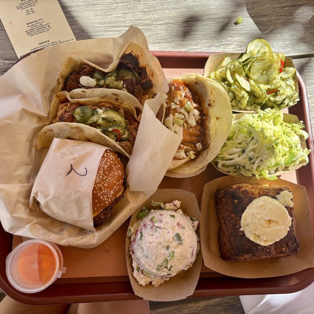 Priedite Barbecue - Bandito burger, 3 tacos (brisket, pork shoulder, chili), potato salad, pickles, cheddar chive biscuit, fennel jalapeño slaw, & hot sauce - Barbeque Near Me - Los Alamos, California Priedite Barbecue - Bandito burger, 3 tacos (brisket, pork shoulder, chili), potato salad, pickles, cheddar chive biscuit, fennel jalapeño slaw, & hot sauce - Barbeque Near Me - Los Alamos, California