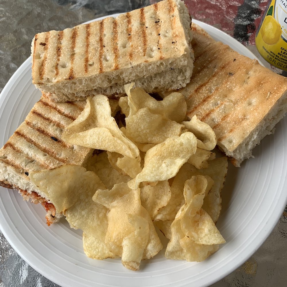 Meatloaf grilled cheese panini with potato chips