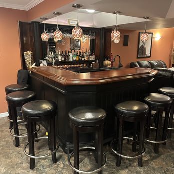 Home Specialty Construction - The bar area has raised ceilings with a recessed bar into the exterior wall. - Damage Restoration Near Me Home Specialty Construction - The bar area has raised ceilings with a recessed bar into the exterior wall. - Damage Restoration Near Me