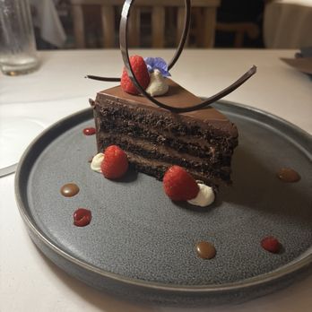 Yachtsman Steakhouse - Yachtsman Signature Chocolate Cake - Steakhouses Near Me - Lake Buena Vista, Florida Yachtsman Steakhouse - Yachtsman Signature Chocolate Cake - Steakhouses Near Me - Lake Buena Vista, Florida