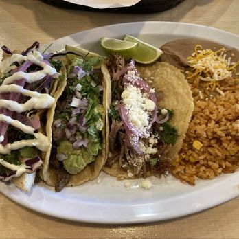 The Villa On Grand - 3 tacos with rice and beans (carnitas, asada and fish). - Mexican Near Me - Escondido, California The Villa On Grand - 3 tacos with rice and beans (carnitas, asada and fish). - Mexican Near Me - Escondido, California