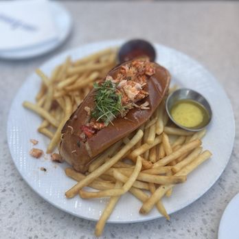 Lighthouse - LOBSTER ROLL*: Warm Lobster, Garlic Butter, French Fries (Sub.), Served with Drawn Butter * $28.99 - Breakfast & Brunch Near Me - Newport Beach, California