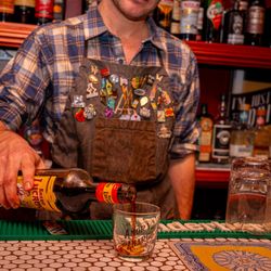 Amor y Amargo - Bartender making a drink