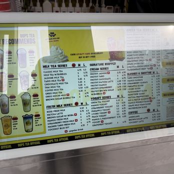 Oops Tea - Menu - A digital menu board at Oops Tea in New York features sections for milk tea, yogurt, smoothies, and coffee. It lists various flavors and options, including classic milk tea, taro milk tea, matcha latte, and more, with prices for medium and large sizes. The menu also includes categories for cream series, frozen milk, and other beverages, with additional details such as popular drinks and special offers. The board is framed in white and positioned at an angle for customer viewing. - Bubble Tea Near Me - New York, New York