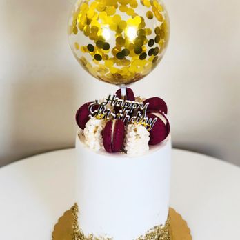 Nurys Cakes - a birthday cake with a balloon on top - Custom Cakes Near Me - Bayonne, New Jersey Nurys Cakes - a birthday cake with a balloon on top - Custom Cakes Near Me - Bayonne, New Jersey