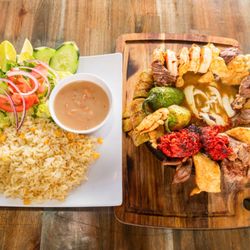 Mariscos Villa Del Mar - Molcajete: chicken, beef, chorizo, shrimp, cheese in a house special sauce