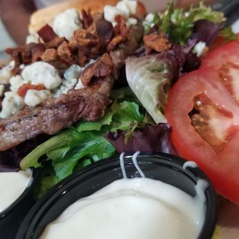 Odyssey World Cafe - Generous rib eye steak salad, perfectly seared quality rib eye,  tender,  juicy, made to please with every bite! - Cafes Near Me - Paso Robles, California