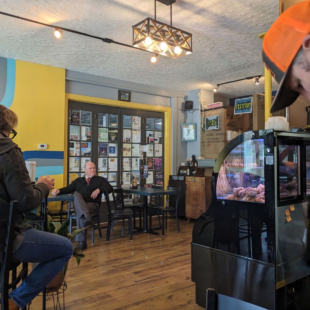 Yellow Mug Coffee Lounge - a man wearing a orange hat - Coffee & Tea Near Me - Weaverville, North Carolina Yellow Mug Coffee Lounge - a man wearing a orange hat - Coffee & Tea Near Me - Weaverville, North Carolina