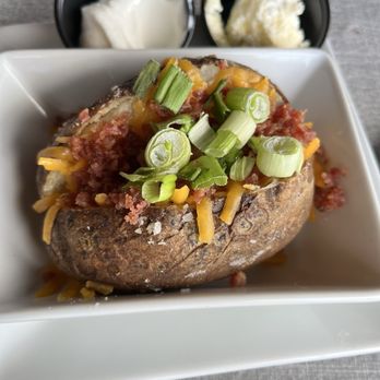 Ruby Tuesday - Loaded baked potato - Burgers Near Me - Elyria, Ohio Ruby Tuesday - Loaded baked potato - Burgers Near Me - Elyria, Ohio