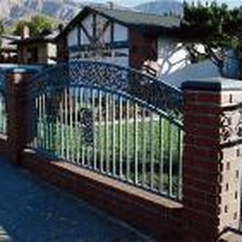 Best Iron Works - a gate and a house in the background - Fences & Gates Near Me - San Bernardino, California Best Iron Works - a gate and a house in the background - Fences & Gates Near Me - San Bernardino, California