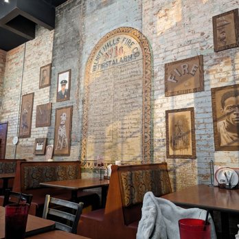 Fireside Pizza - Wall decor, old fire house station turned pizza place. - Pizza Near Me - Cincinnati, Ohio