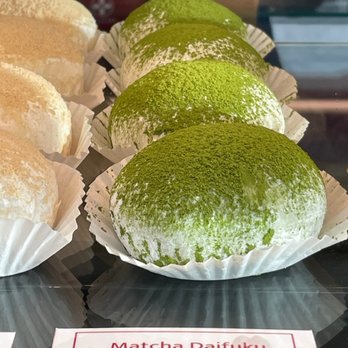 Bloom Cafe - a selection of matcha donuts on display - Cafes Near Me - Toronto, Ontario Bloom Cafe - a selection of matcha donuts on display - Cafes Near Me - Toronto, Ontario