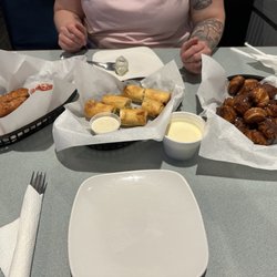 The Hive Bar & Grill - Mozzarella sticks, southwest egg rolls, pretzel bites