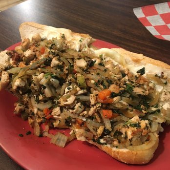 Pepper Jack's - a hot dog on a red plate - Cheesesteaks Near Me - Albany, New York