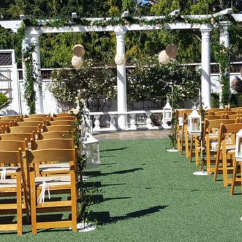 Pink Petals - Ceremony Walkway Lanterns & Flowers by Pink Petals at 4/16/16 wedding in Monterey (photo by wedding guest) - Florists Near Me Pink Petals - Ceremony Walkway Lanterns & Flowers by Pink Petals at 4/16/16 wedding in Monterey (photo by wedding guest) - Florists Near Me