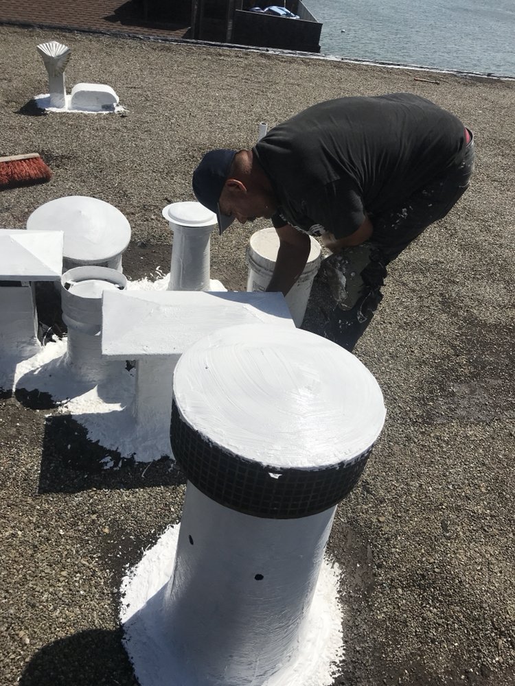 Slide of Francos Roofing