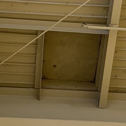 Leaking roof causing wet basketball court. DANGER! Leaking roof causing wet basketball court. DANGER!