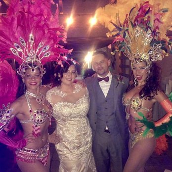 Samba Conmigo - My husband and I with the beautiful samba dancers on my wedding night! - Performing Arts Near Me - San Jose, California Samba Conmigo - My husband and I with the beautiful samba dancers on my wedding night! - Performing Arts Near Me - San Jose, California