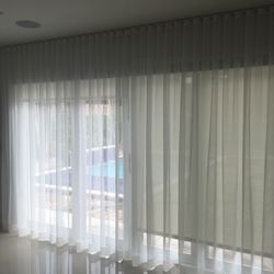 The Paint Spot - 5% roller shade with a beautiful sheer curtain.