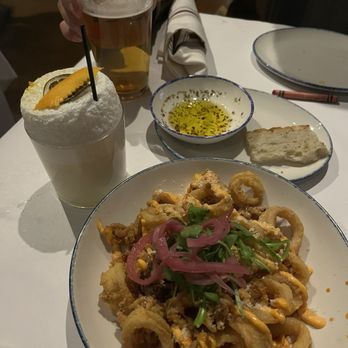 Trattoria Polipo - Calamari, bread and oil, gin fizz drink, and pilsner - Italian Near Me - Augusta, Georgia Trattoria Polipo - Calamari, bread and oil, gin fizz drink, and pilsner - Italian Near Me - Augusta, Georgia